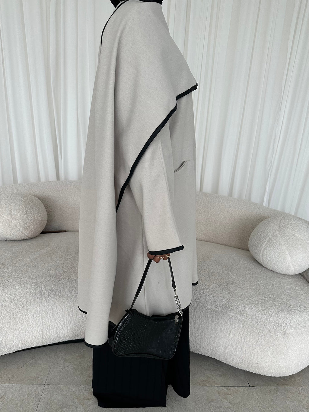 Leather trimmed coat with scarf