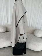 Leather trimmed coat with scarf
