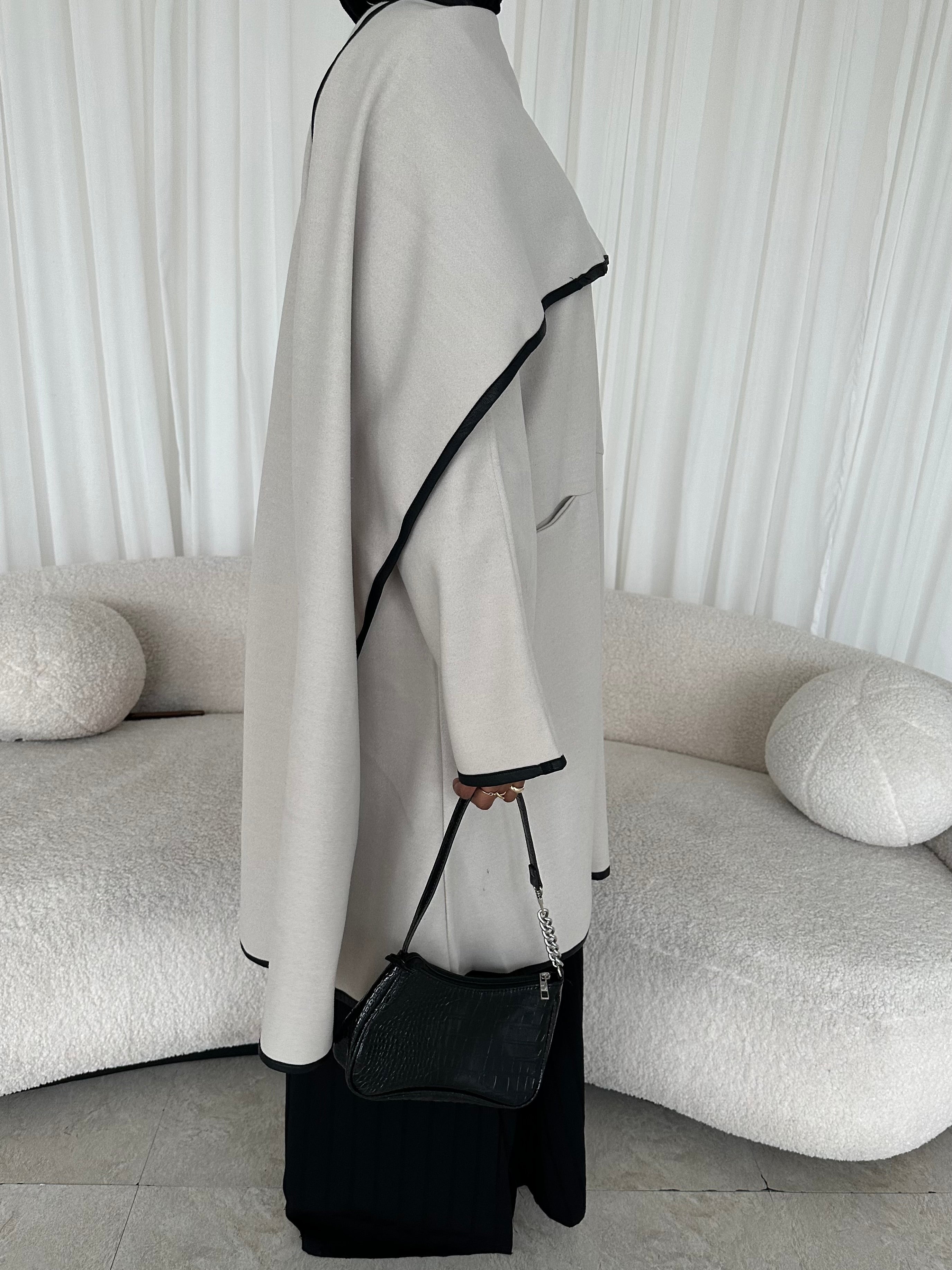 Leather trimmed coat with scarf