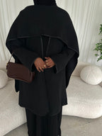 Leather trimmed coat with scarf