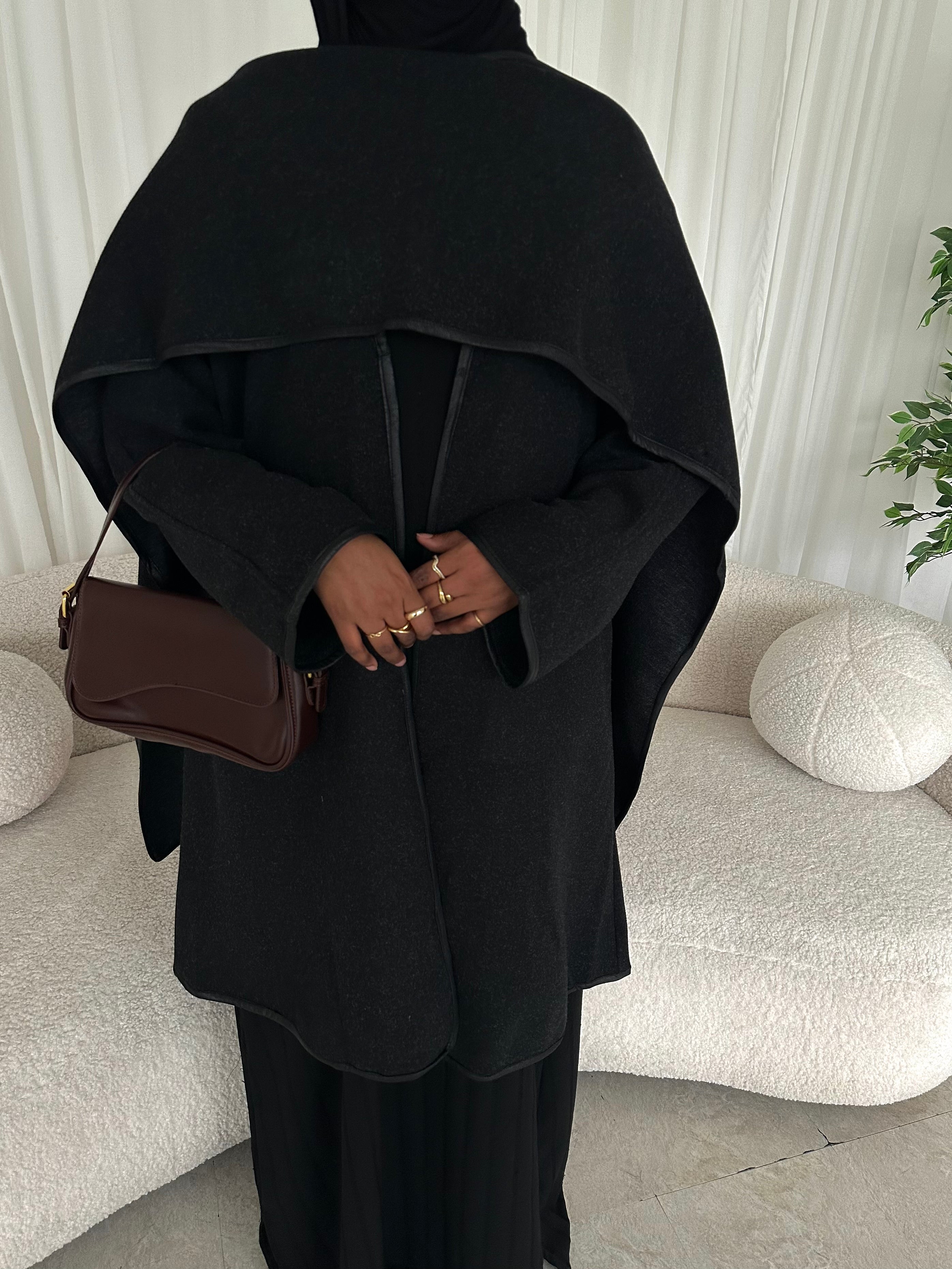 Leather trimmed coat with scarf