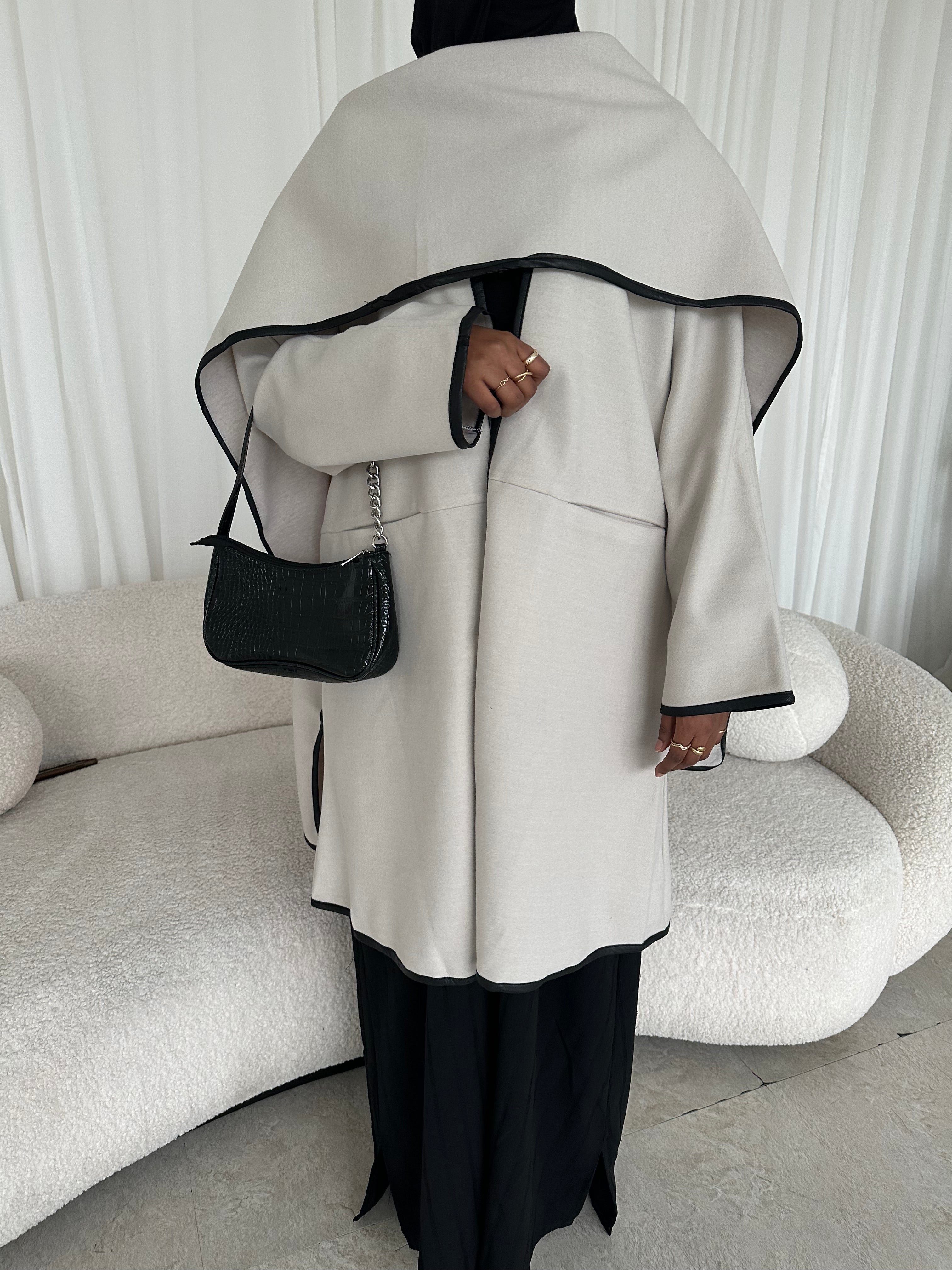 Leather trimmed coat with scarf