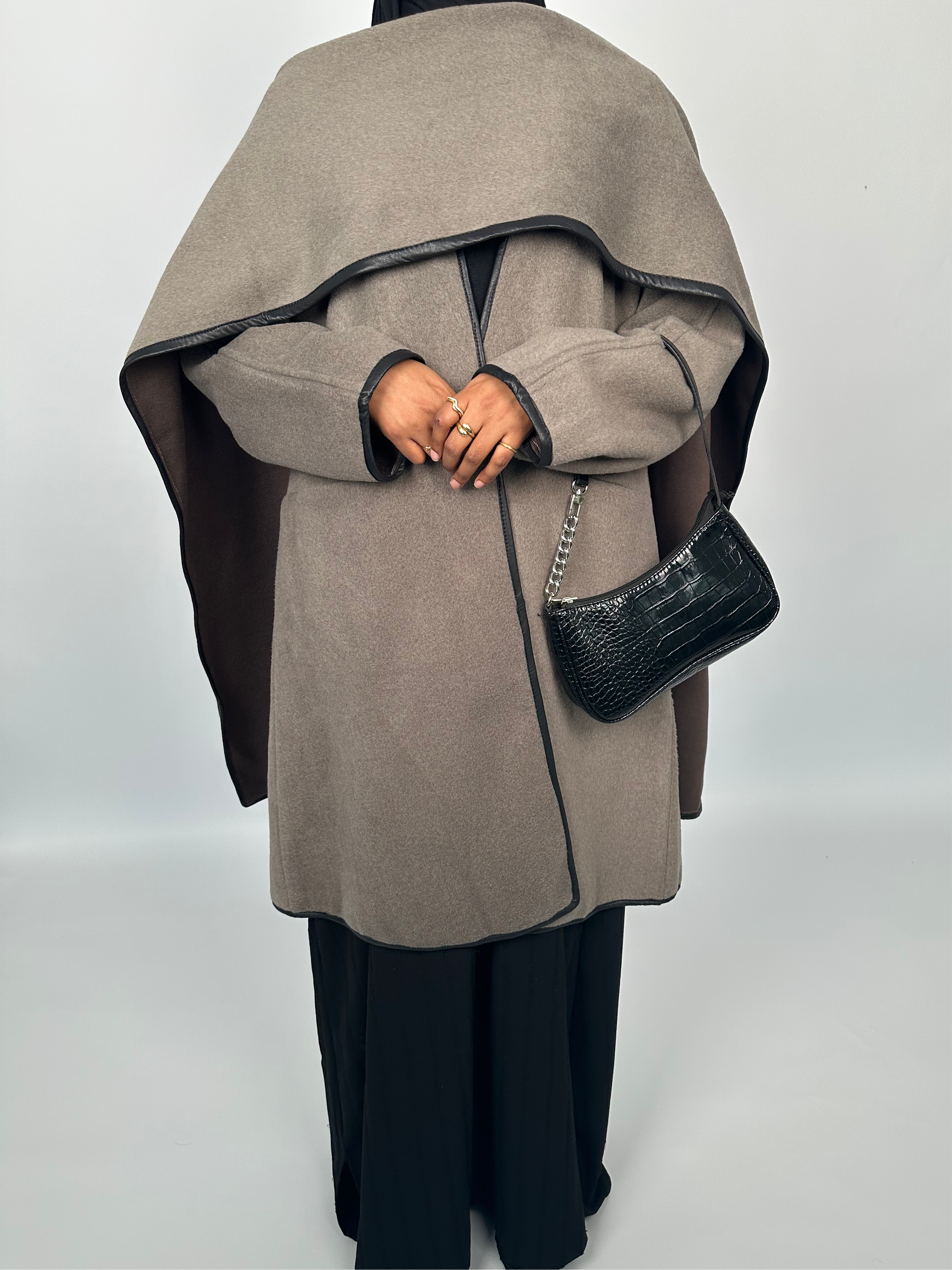 Leather trimmed coat with scarf