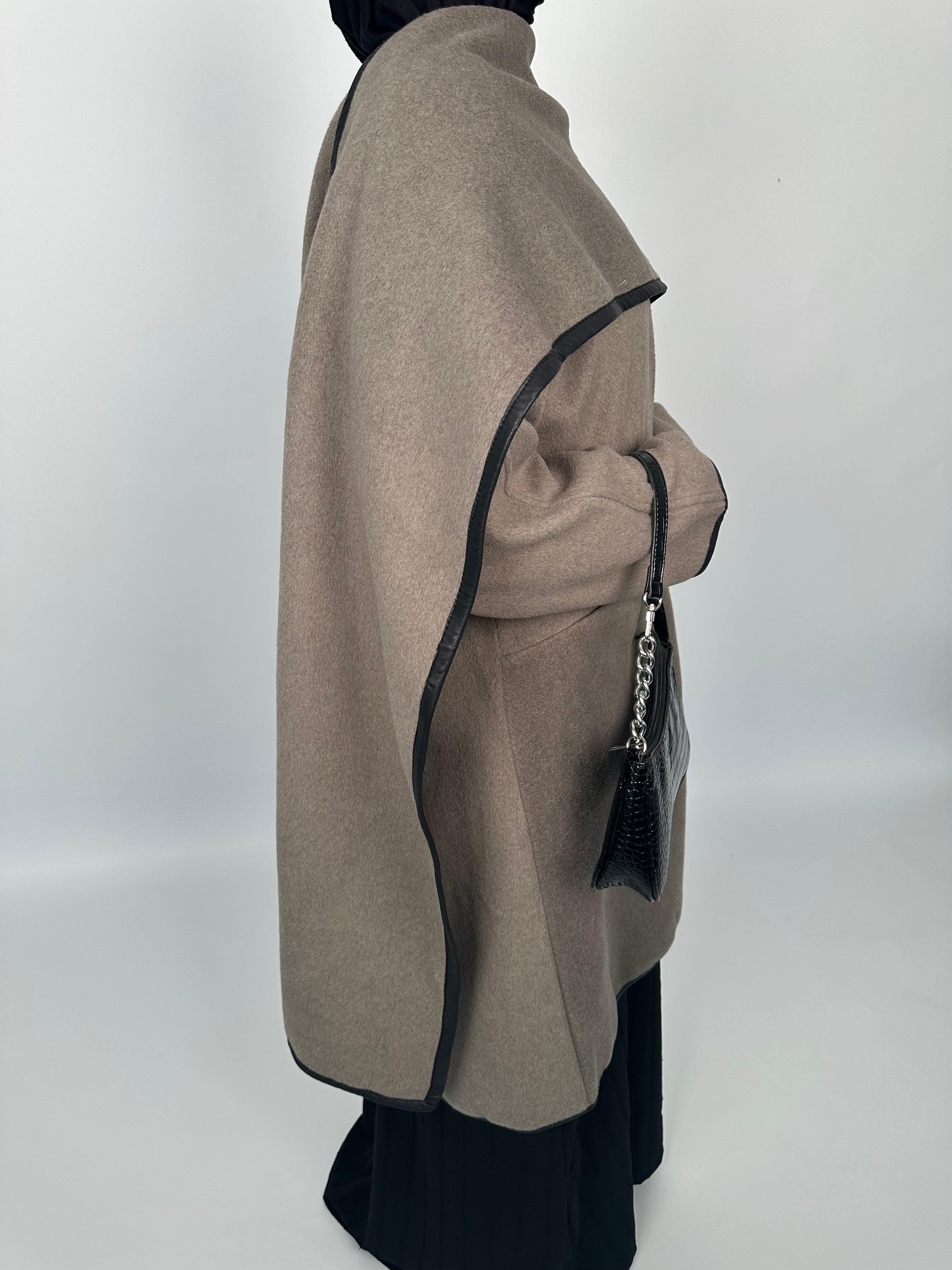Leather trimmed coat with scarf